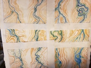 Handpainted on cream linen, various fantasy desert watersheds showing rust and pink sandstone cliffs, and green valleys with blue streams. 